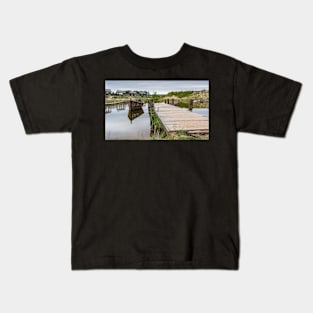 Peaceful landscape with lake and wooden boat Kids T-Shirt